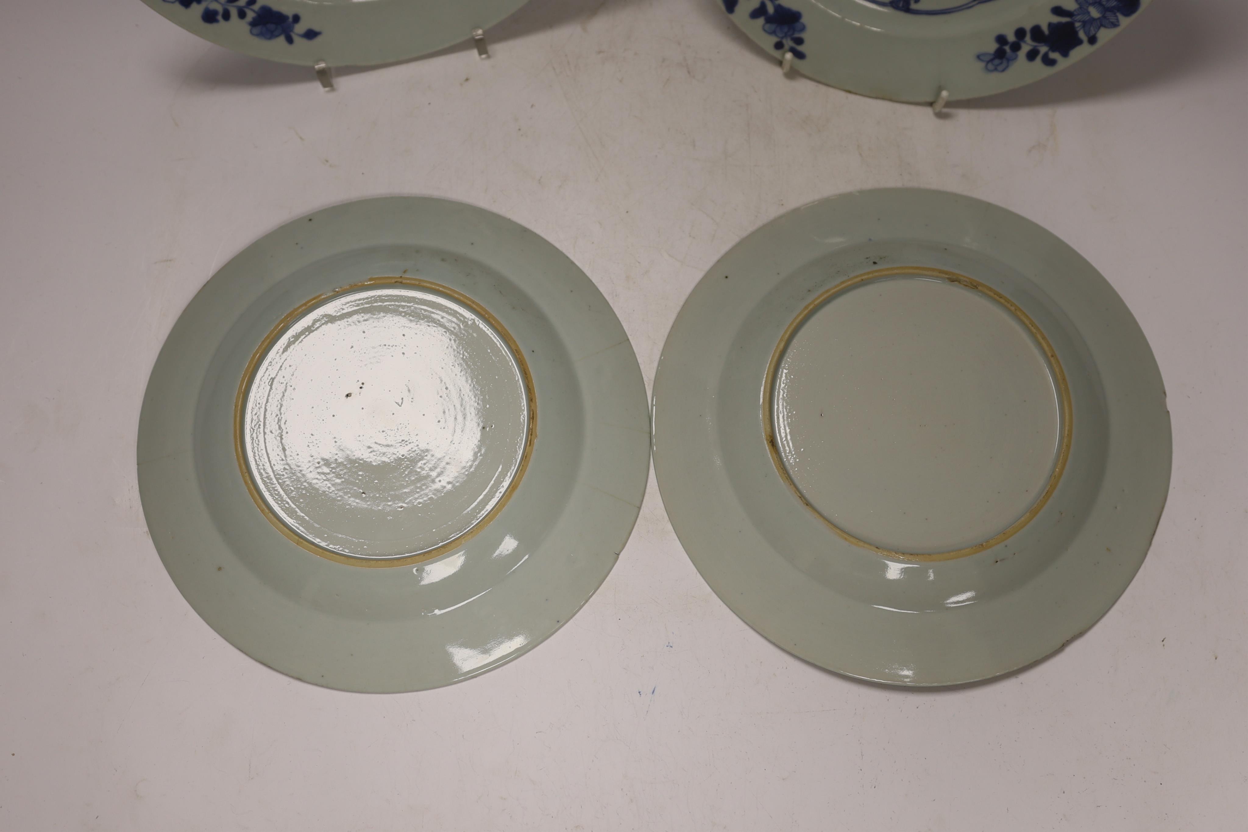 A set of four 18th century Chinese export blue and white plates, 23cm